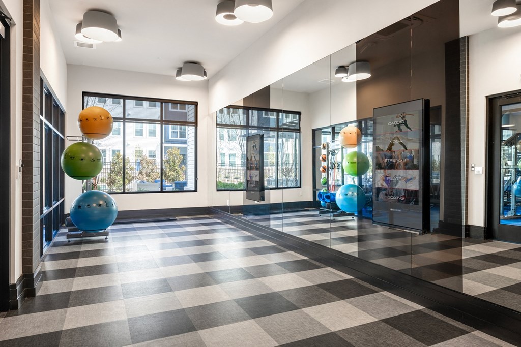 the lobby of a building with a checkered floor