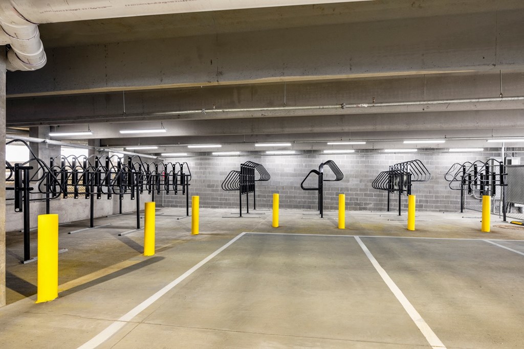a parking garage filled with empty parking spaces