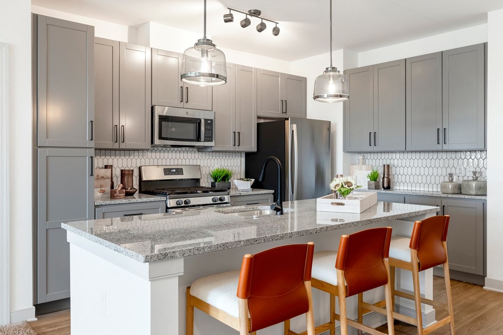 The Forge kitchen with a large island with four chairs