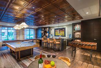 Billiards, foosball and fun in the community lounge at Mira Upper Rock, Maryland