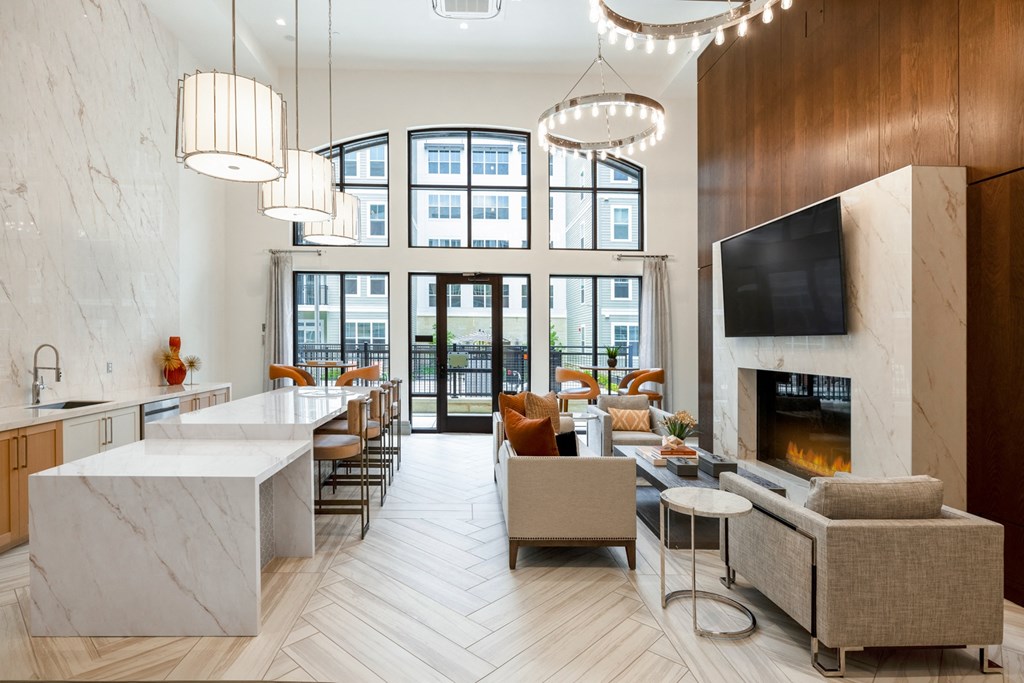 a living room filled with furniture and a fire place