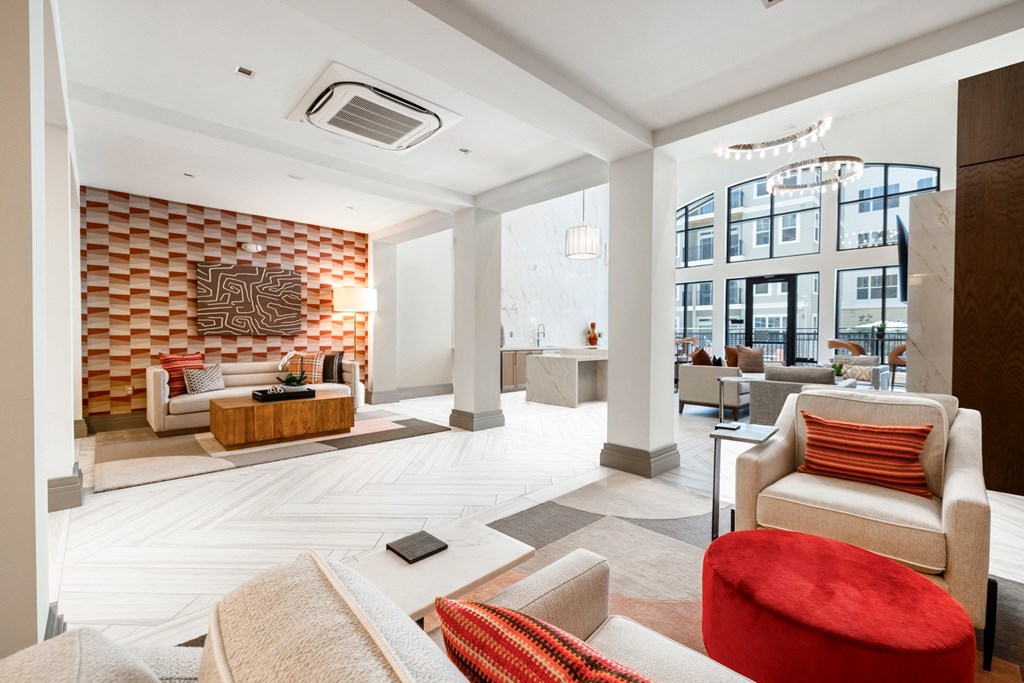a living room with white walls and white floors