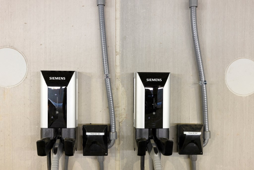 a picture of three ethernet cables plugged into a wall