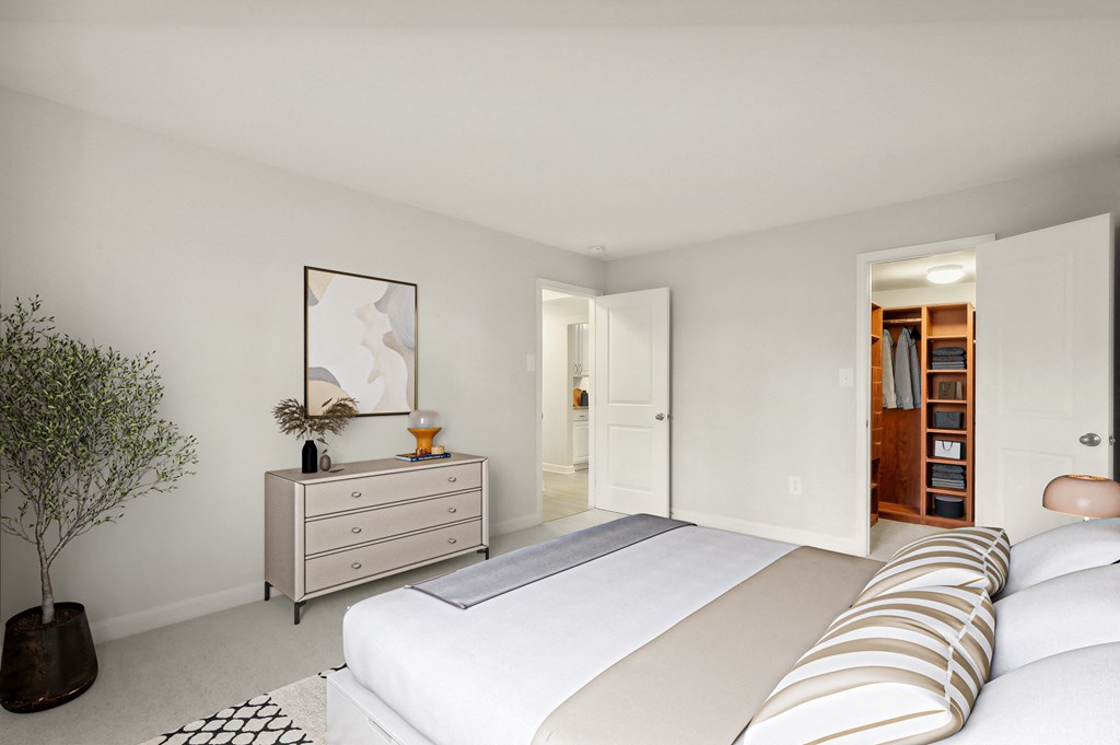 a white bedroom with a large bed and a dresser at Ellicott Grove, Ellicott City, MD 