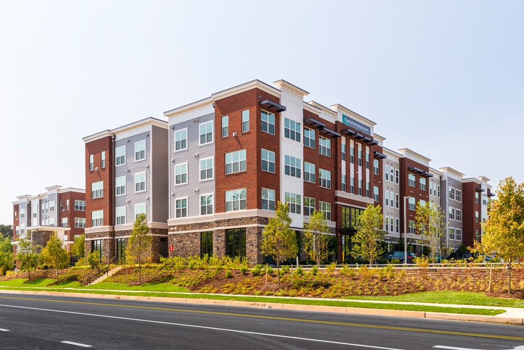 a large apartment building on a sunny day