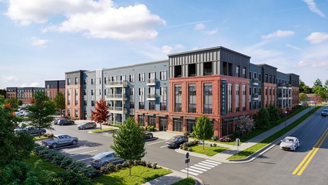 Modern apartment community exterior with parking area at The Terrace Apartments, Maryland, 21701