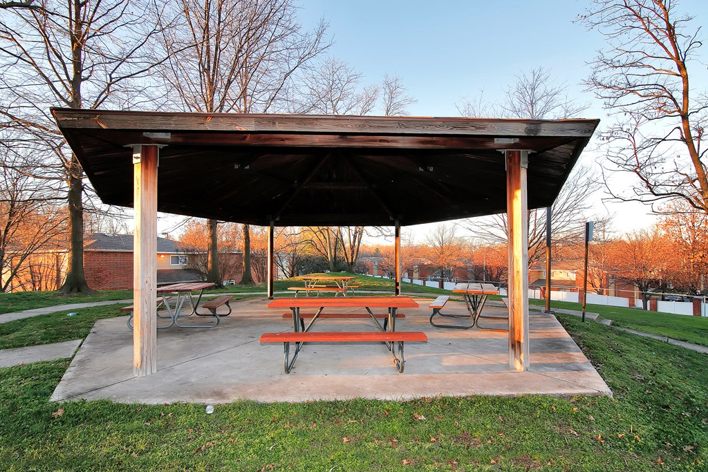 a picnic table under a shelter in a park at Villages at Morgan Metro, Maryland
