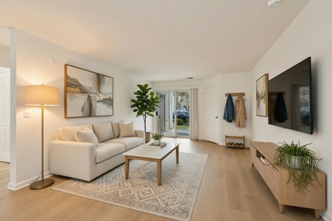 Bright living room with neutral decor at Park at Winterset Apartments, Owings Mills, 21117