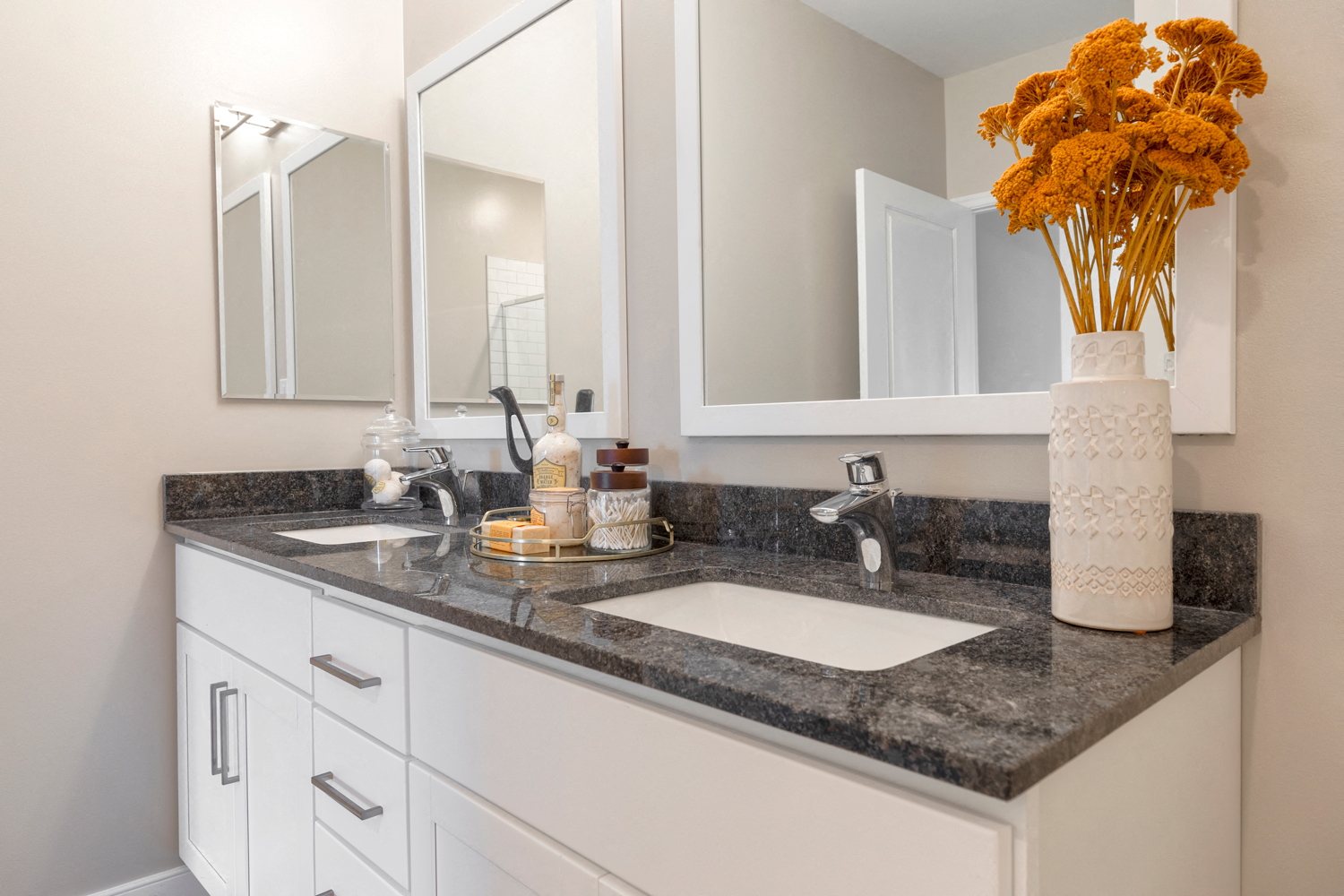 a bathroom with a sink and a mirror
