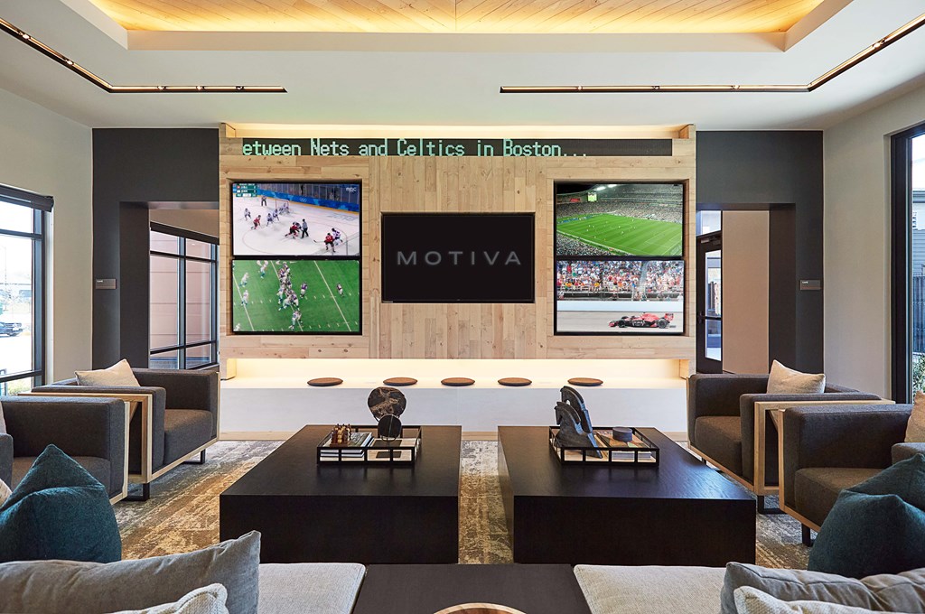 Clubhouse lounge with coffee bar and dining spaces