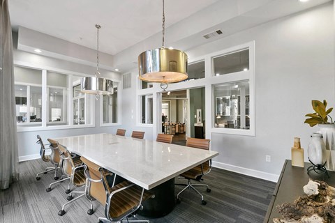 A conference room with a long table and chairs at Prairie Crossing, Farmers Branch, TX 75244
