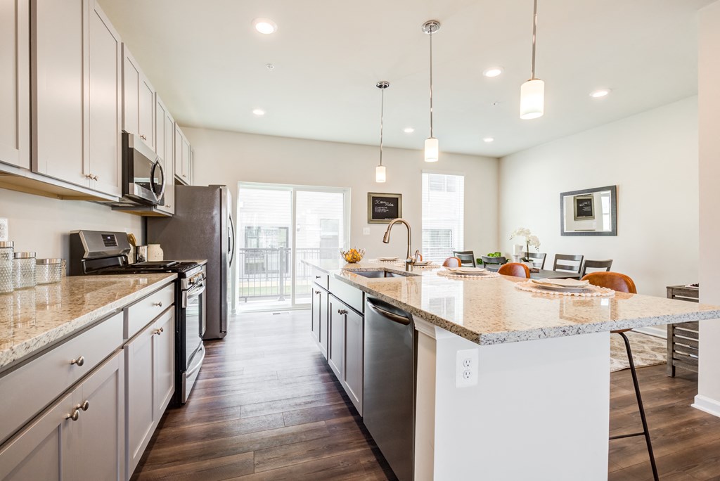 Kitchen with Island and Appliances at Refinery Row, Baltimore, MD 21224