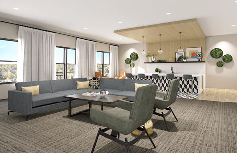 A modern living room with a grey sofa and a wooden coffee table.