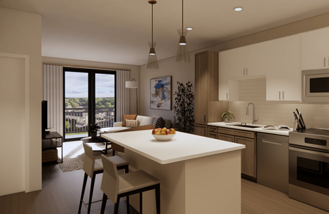 A modern kitchen with a dining table and chairs.