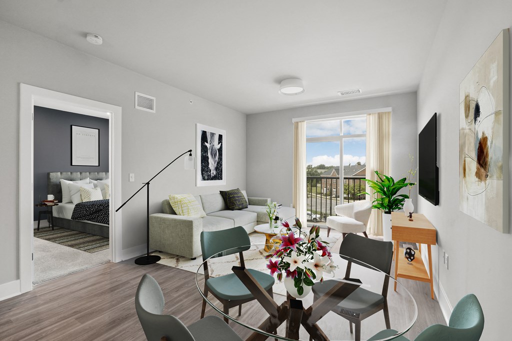 Living Room With Dining Area at Woodmore Apartments, Bowie, MD