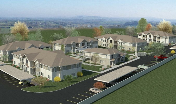 an aerial view of a neighborhood with houses and cars