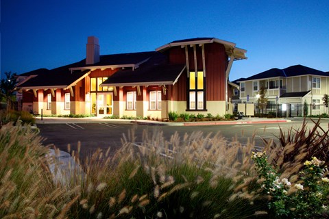 the building where the motel is located is lit up at night