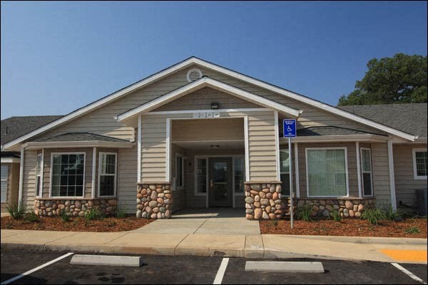 a building with a parking lot in front of it