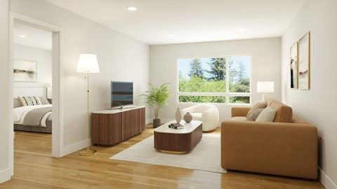 A modern living room with a brown sofa and a television.