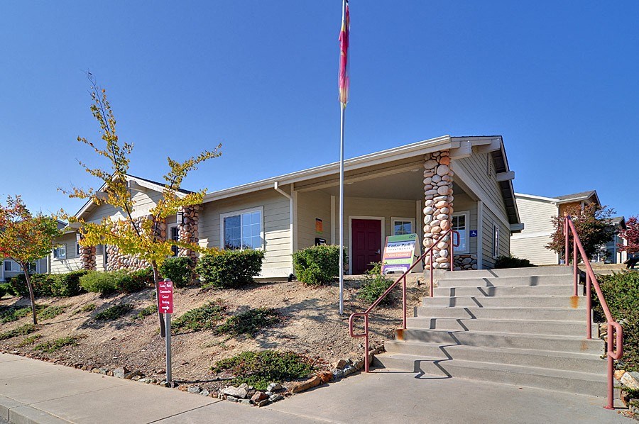 a building with a flag in front of it