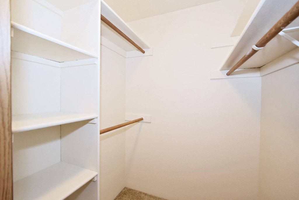 a walk in closet in a 555 waverly unit