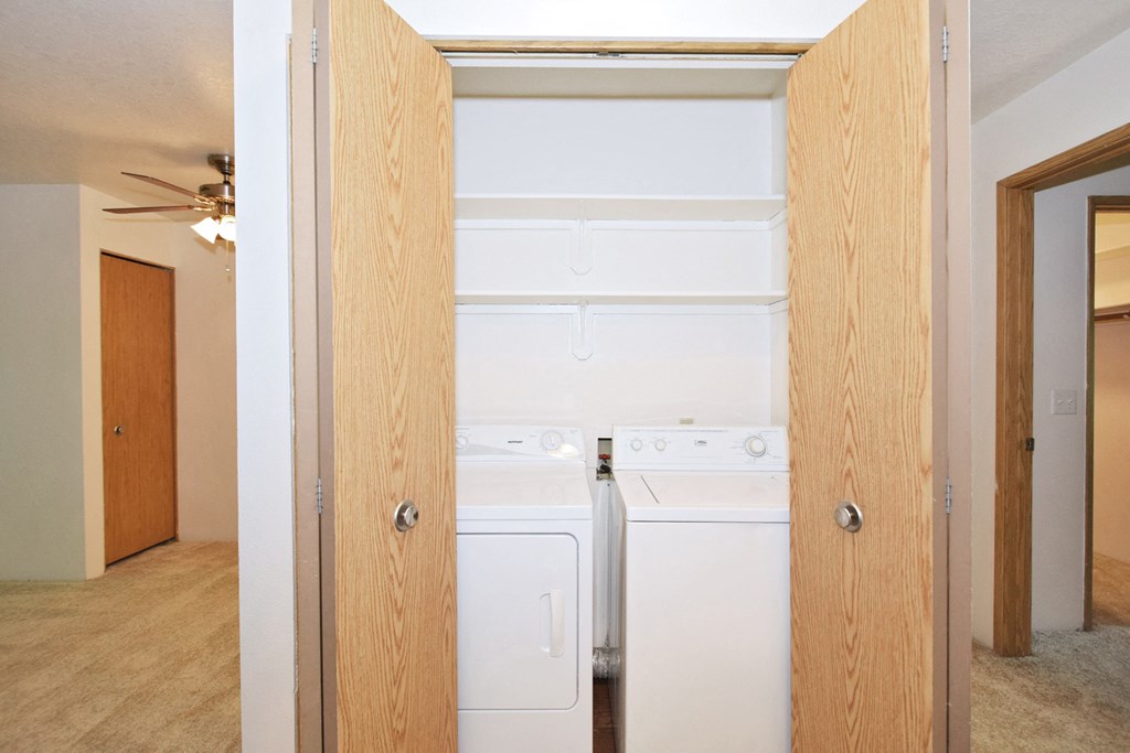 a laundry room with a washer and dryer