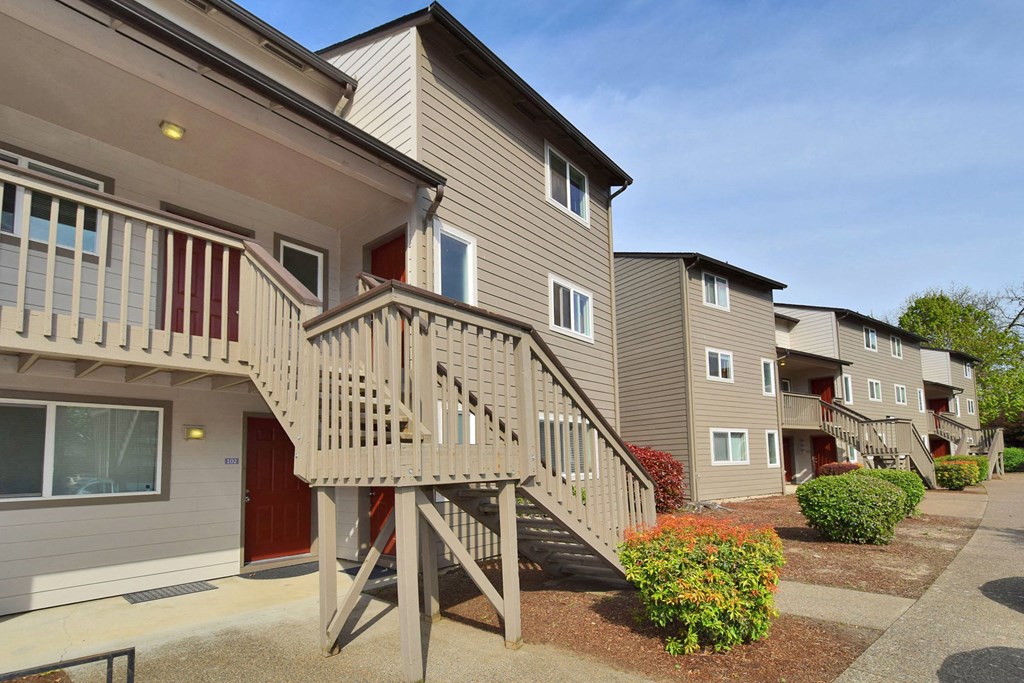 a view of an apartment building with a staircase