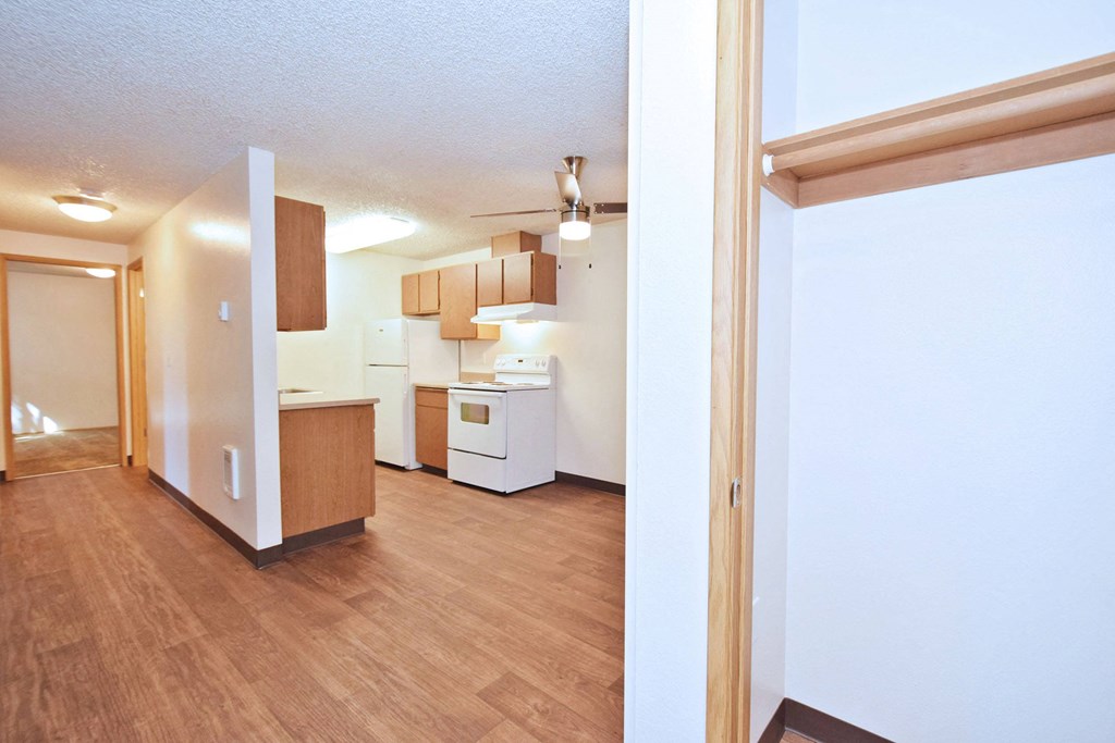 a kitchen and living room in a 555 waverly unit