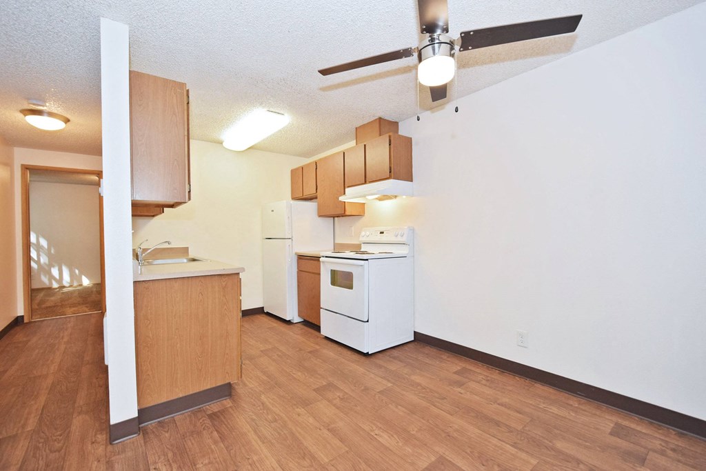 a kitchen and dining area in a 555 waverly unit
