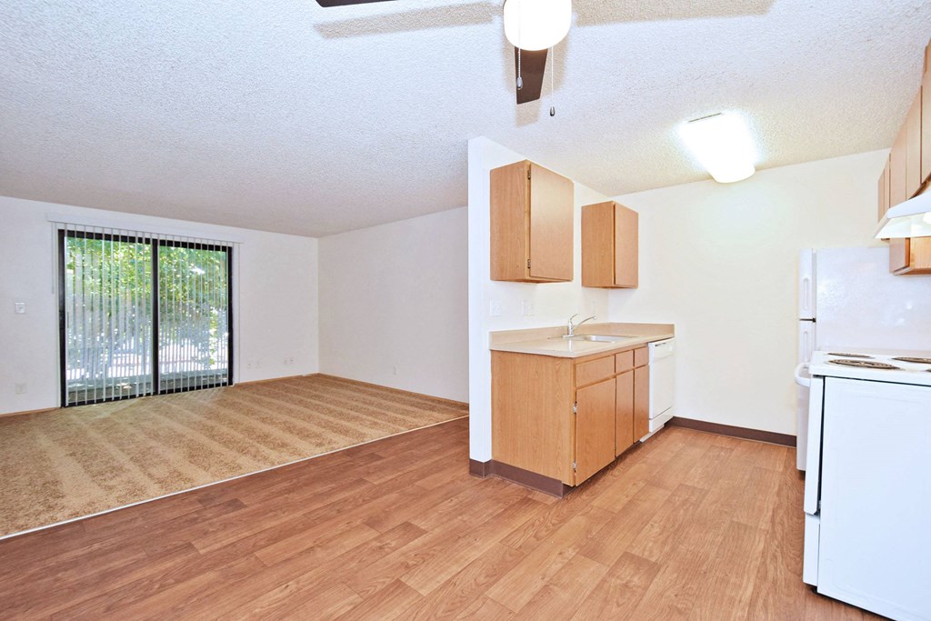 a kitchen and living room in a 555 waverly unit