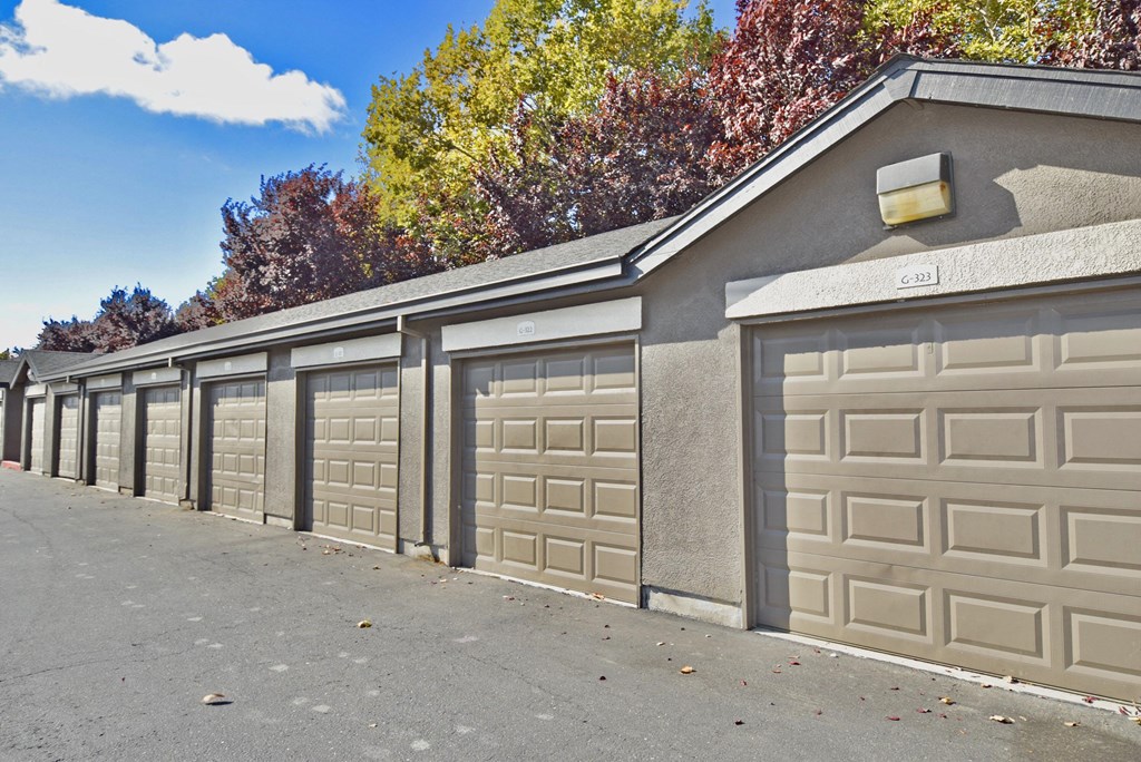a row of garage doors on the side of a building