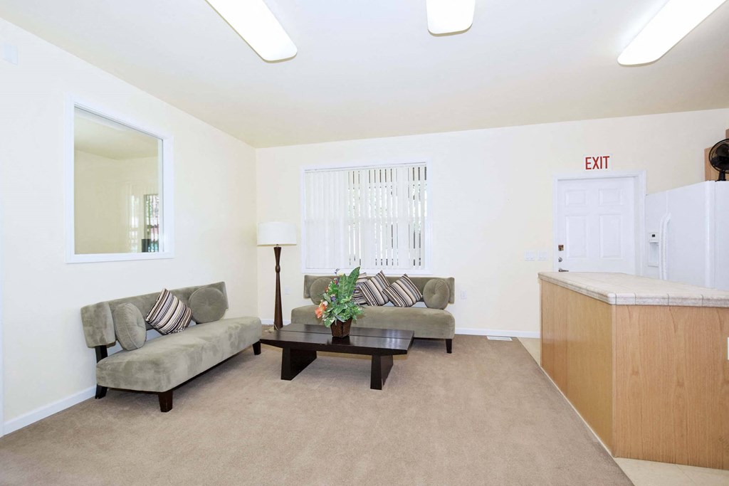 a living room with a couch and a table