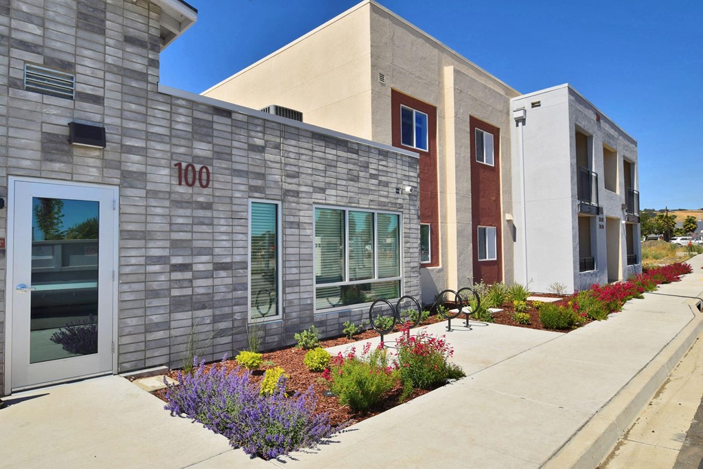 the front of a building with the number 100 on it