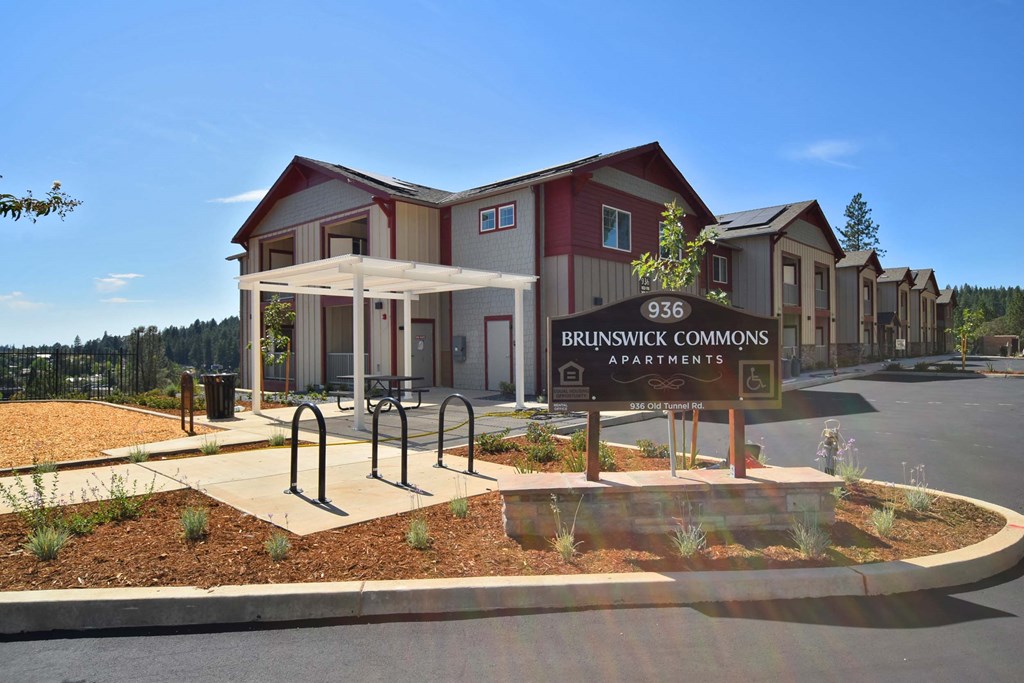 a building with a street sign in front of it