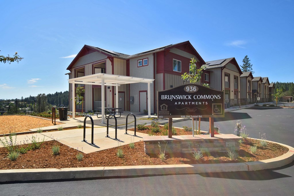 a building with a street sign in front of it