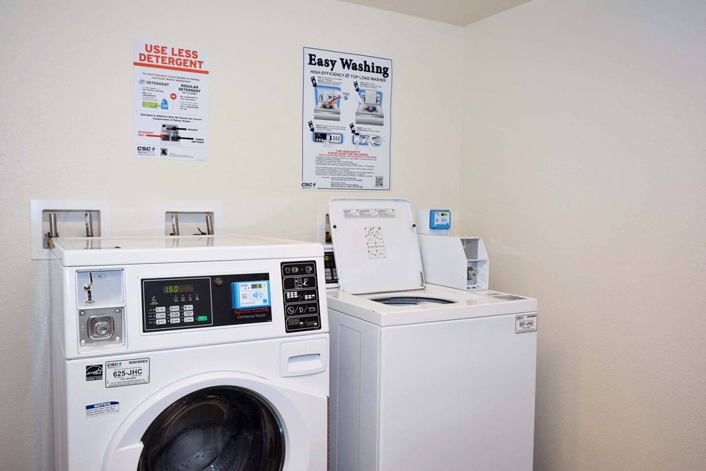 a washer and dryer are available in the laundry room
