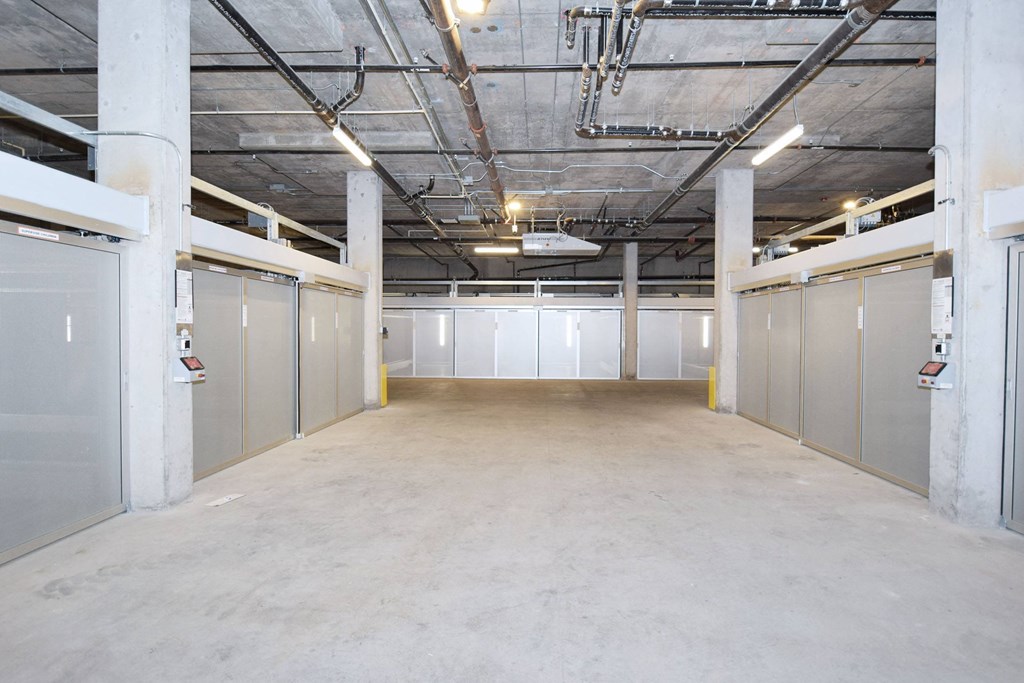 the inside of a building with white doors