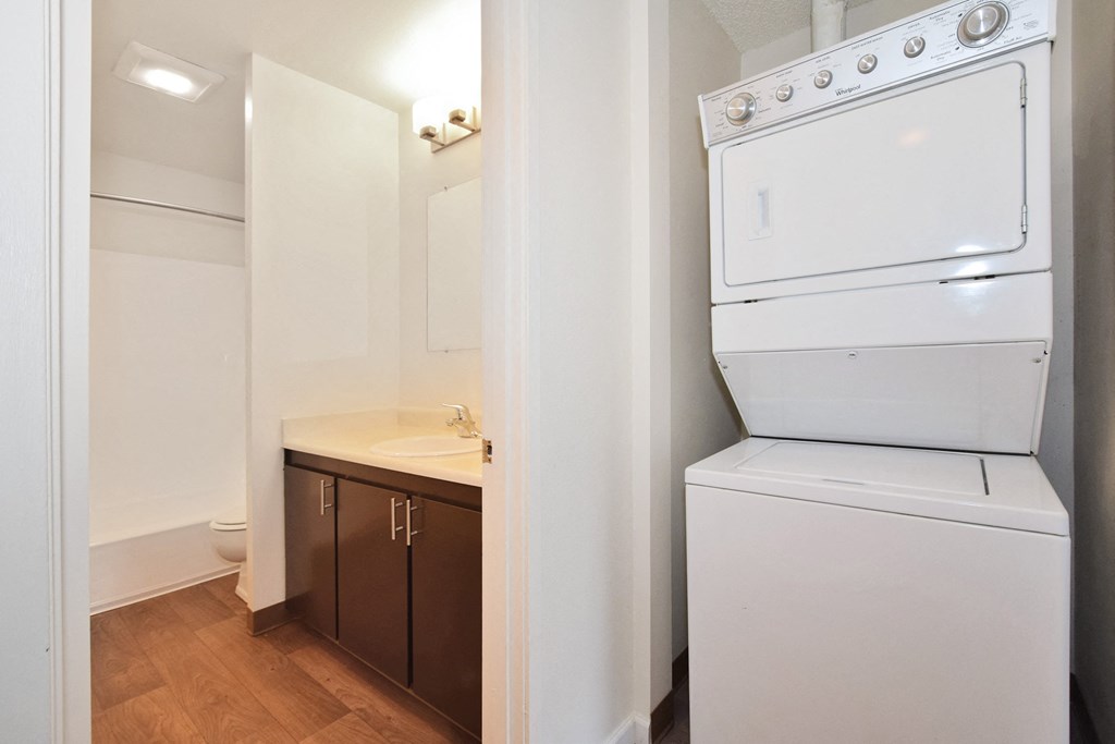 Timberwood Beaverton:  a bathroom with a washer and dryer