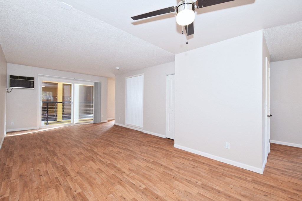 20th and Brooklyn  a living room with hardwood floors and a ceiling fan