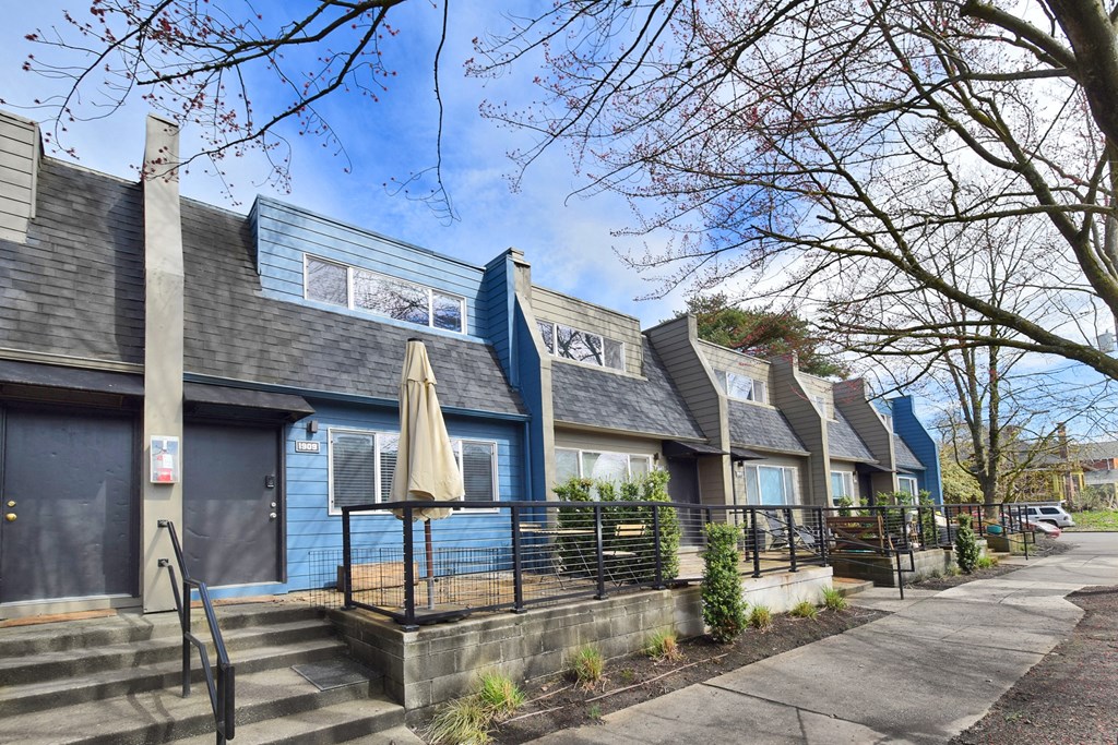 20th and Brooklyn  a row of houses with blue shingles