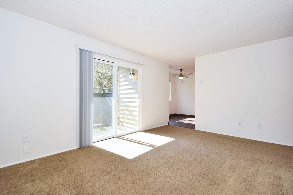Crescent Ridge bedroom with a sliding glass door and a carpeted floor