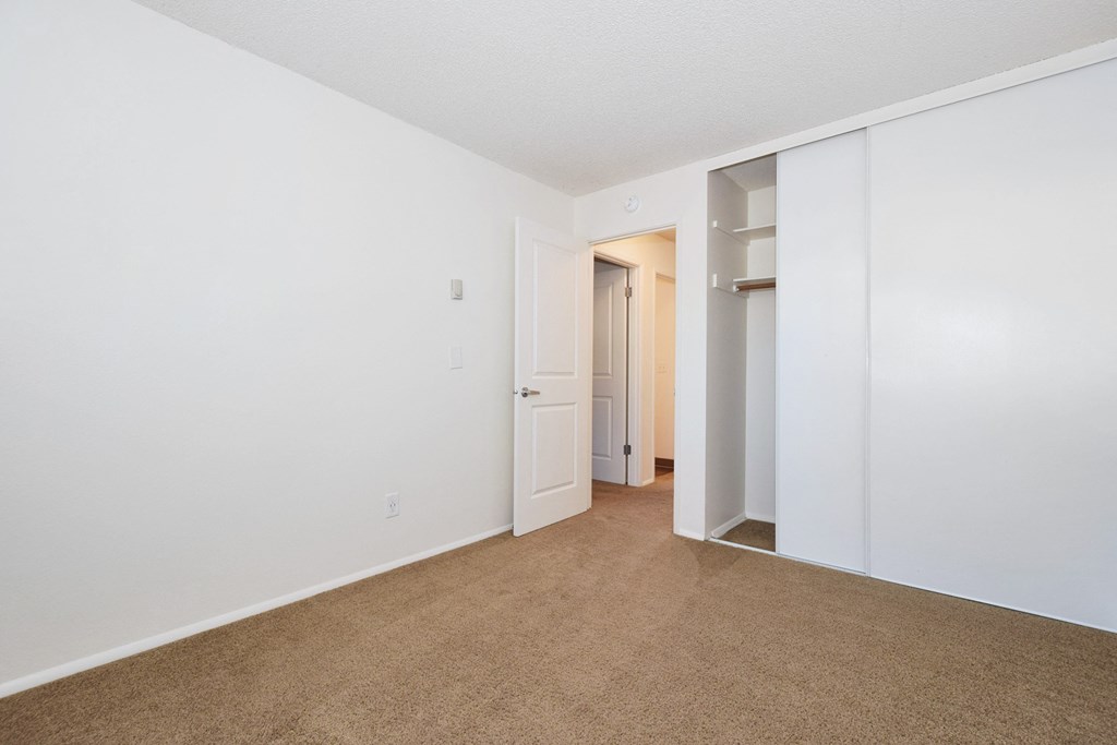 Crescent Ridge bedroom with white walls and carpet
