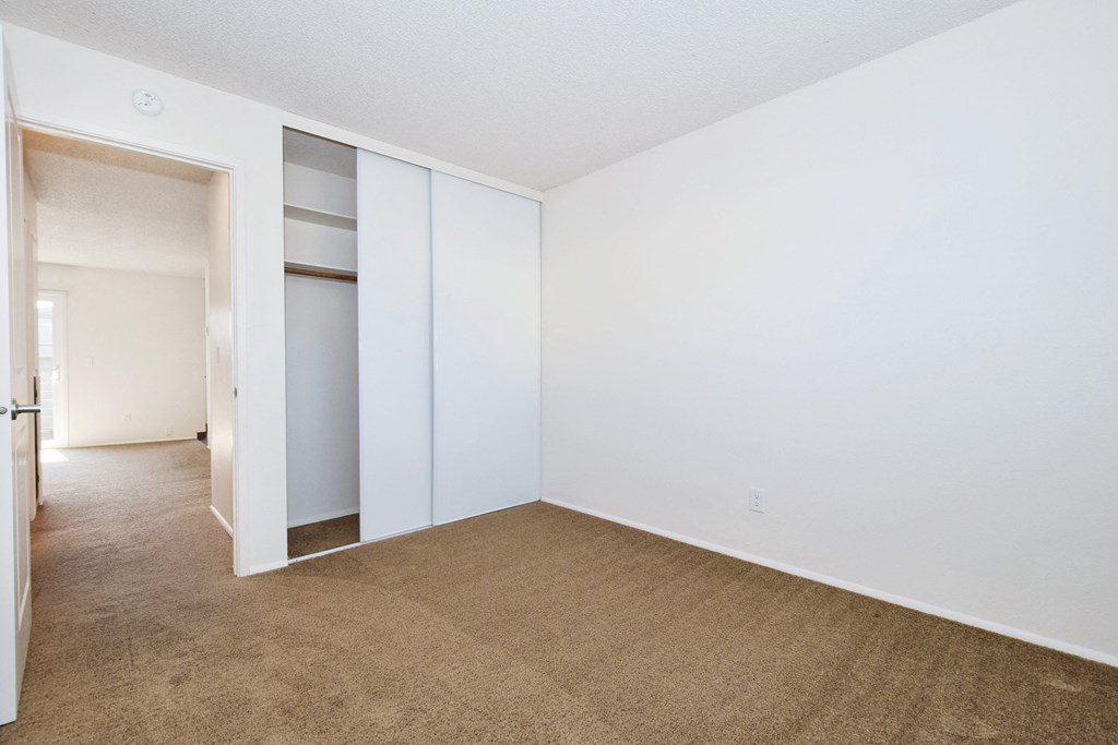 Crescent Ridge bedroom with white walls and carpet