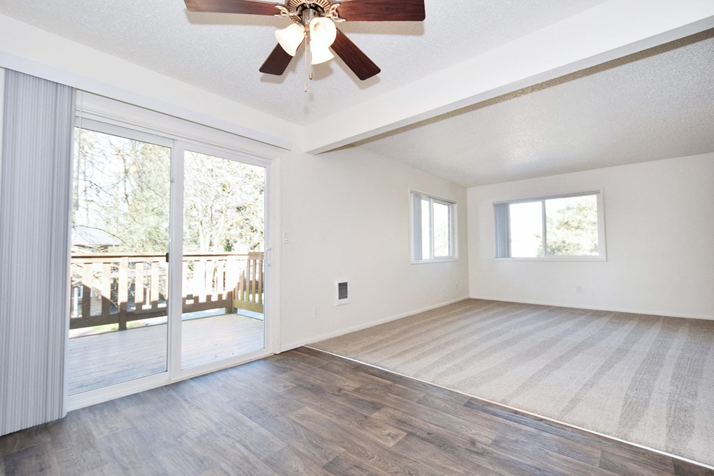 Birnam West an empty living room with a ceiling fan