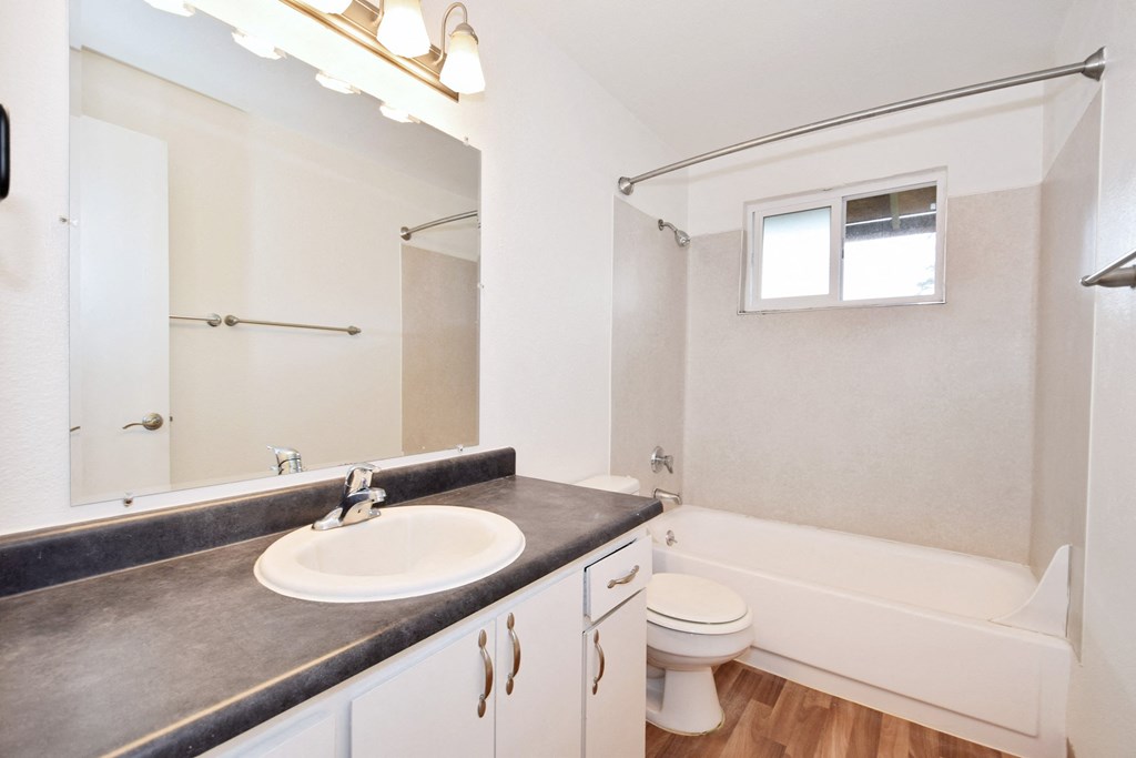 The Firs: bathroom with a sink toilet and bathtub