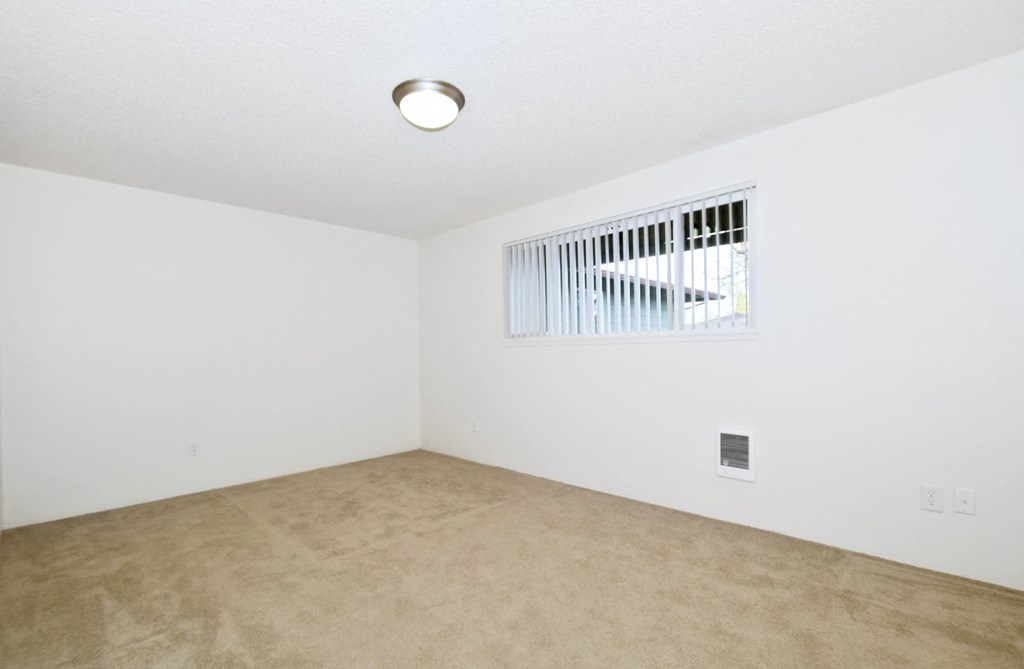 The Firs: bedroom with white walls and carpet