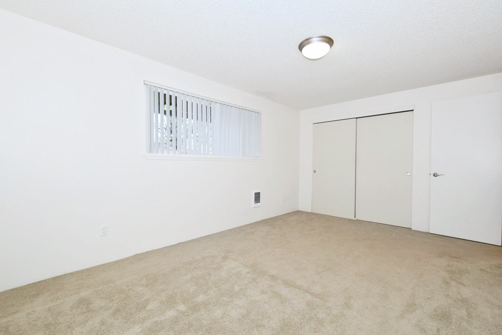 The Firs: bedroom with white walls and carpet