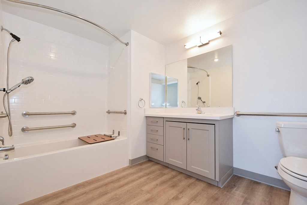 a bathroom with a toilet sink and bathtub