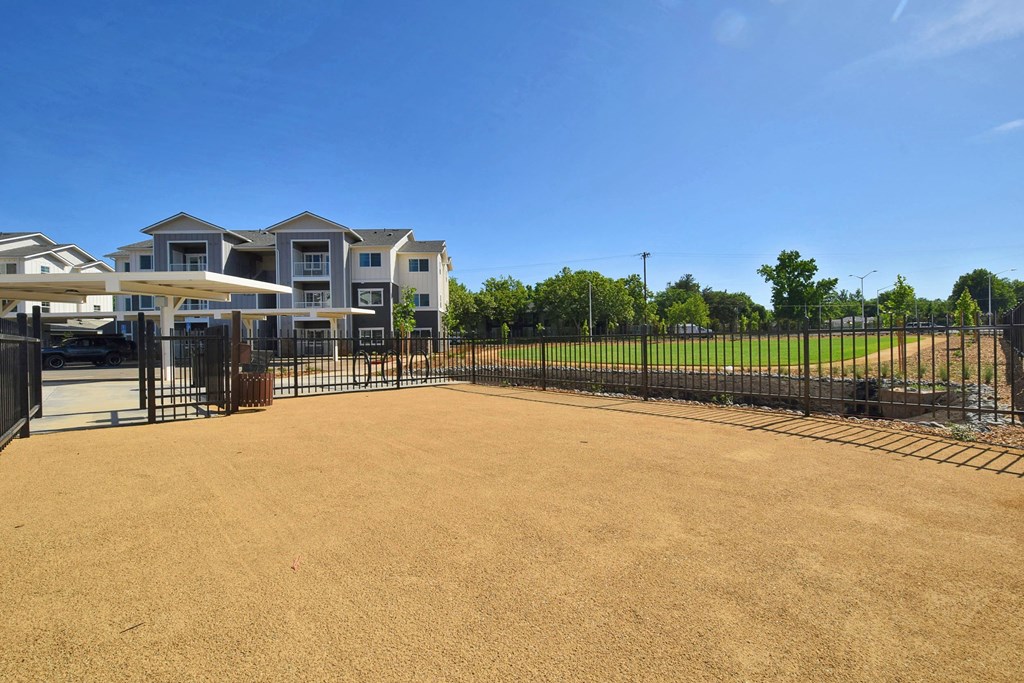 a fenced in yard at the whispering winds apartments in pearland, tx
