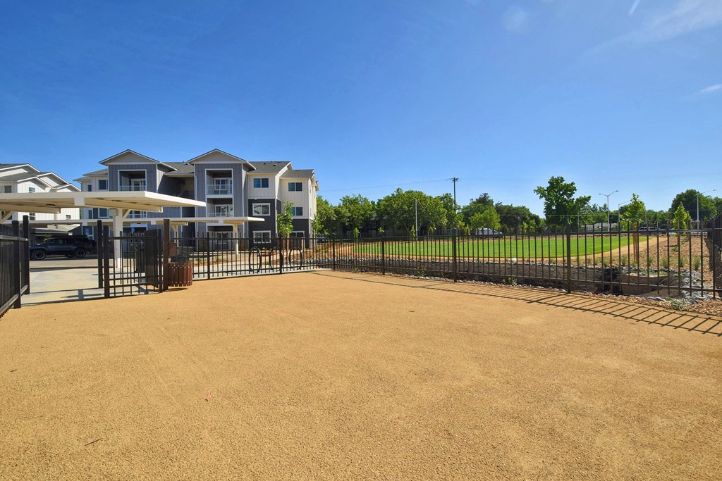 a fenced in yard at the whispering winds apartments in pearland, tx